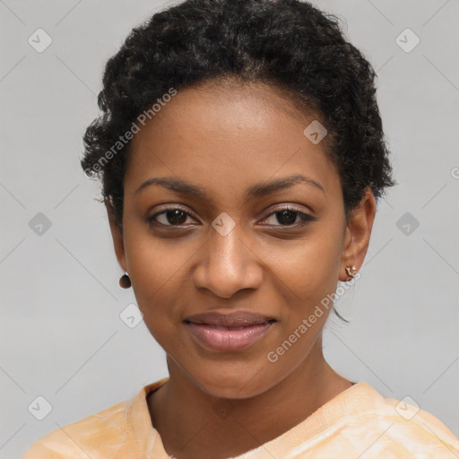 Joyful black young-adult female with short  black hair and brown eyes