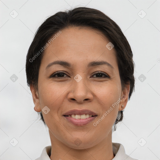 Joyful white adult female with short  brown hair and brown eyes