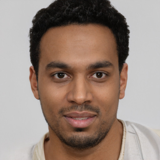 Neutral black young-adult male with short  black hair and brown eyes