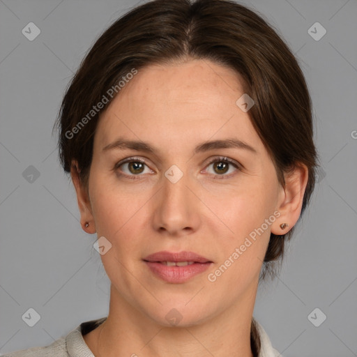 Joyful white adult female with medium  brown hair and grey eyes