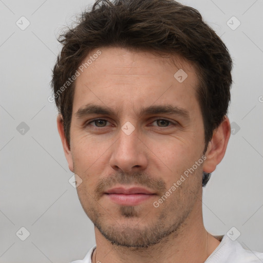 Neutral white young-adult male with short  brown hair and brown eyes