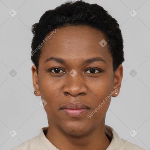 Joyful black young-adult female with short  black hair and brown eyes