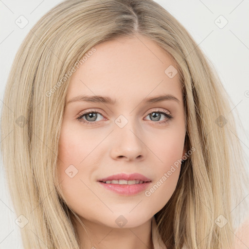 Joyful white young-adult female with long  brown hair and blue eyes