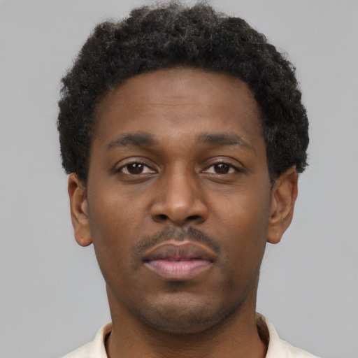 Neutral black young-adult male with short  brown hair and brown eyes
