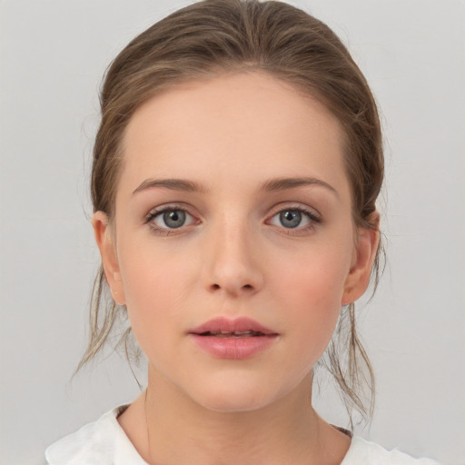 Neutral white young-adult female with medium  brown hair and grey eyes