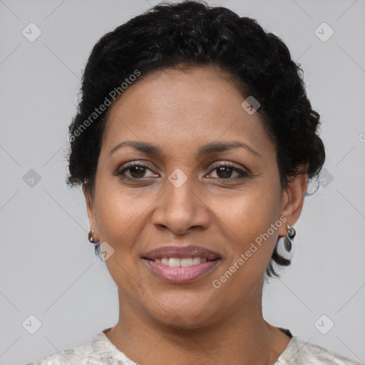 Joyful latino young-adult female with short  brown hair and brown eyes