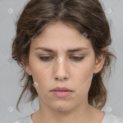 Neutral white young-adult female with medium  brown hair and brown eyes