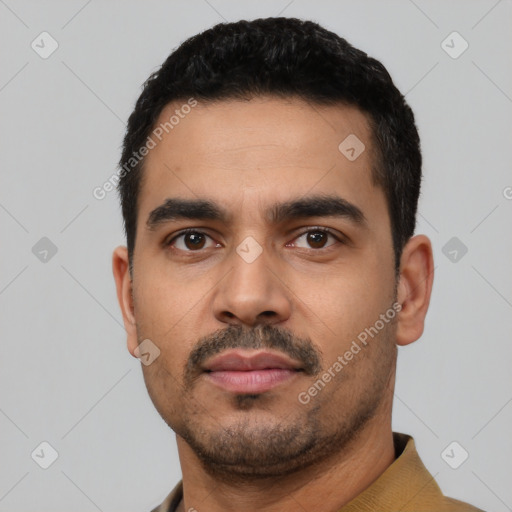 Neutral latino young-adult male with short  black hair and brown eyes