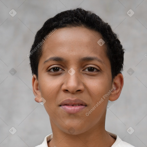 Joyful latino young-adult female with short  black hair and brown eyes