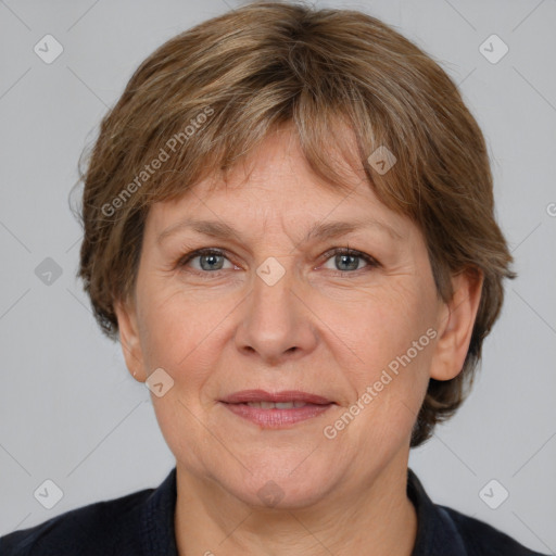 Joyful white adult female with medium  brown hair and grey eyes