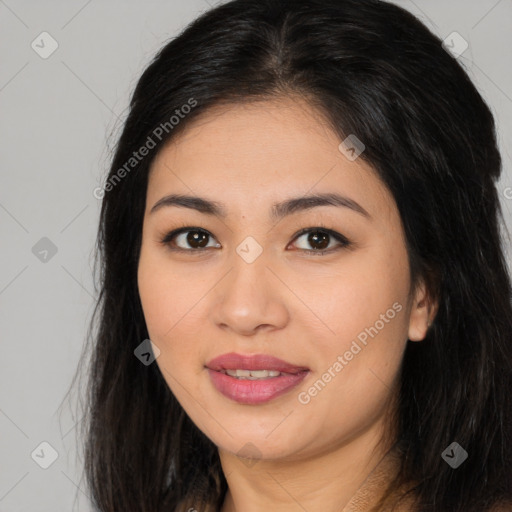 Joyful asian young-adult female with long  brown hair and brown eyes