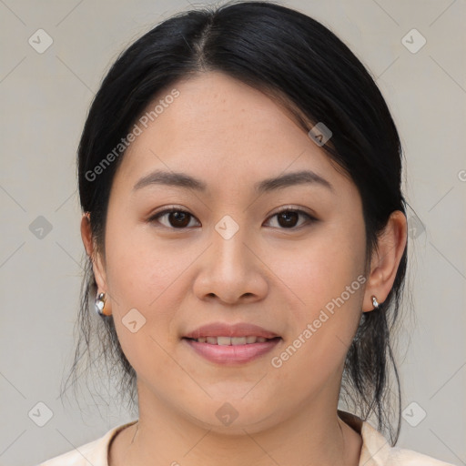 Joyful asian young-adult female with medium  brown hair and brown eyes