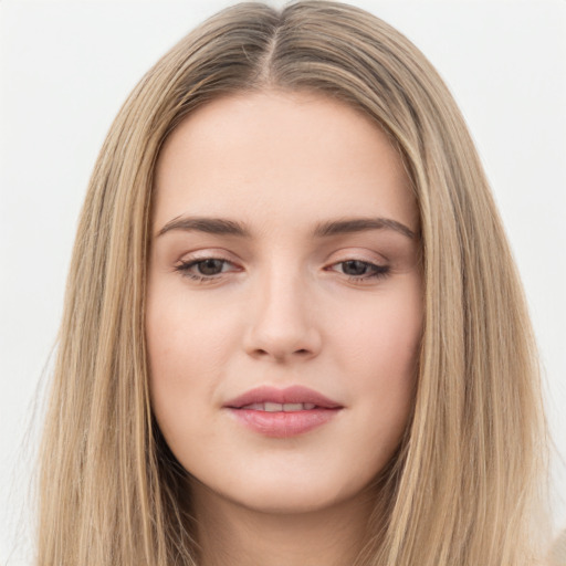 Neutral white young-adult female with long  brown hair and brown eyes