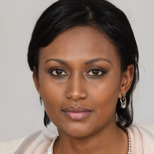 Neutral black young-adult female with medium  black hair and brown eyes