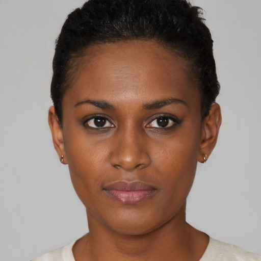 Neutral black young-adult female with short  black hair and brown eyes