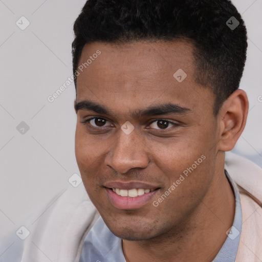 Joyful white young-adult male with short  black hair and brown eyes