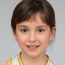 Joyful white child female with medium  brown hair and brown eyes