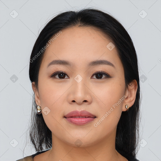 Joyful asian young-adult female with medium  black hair and brown eyes