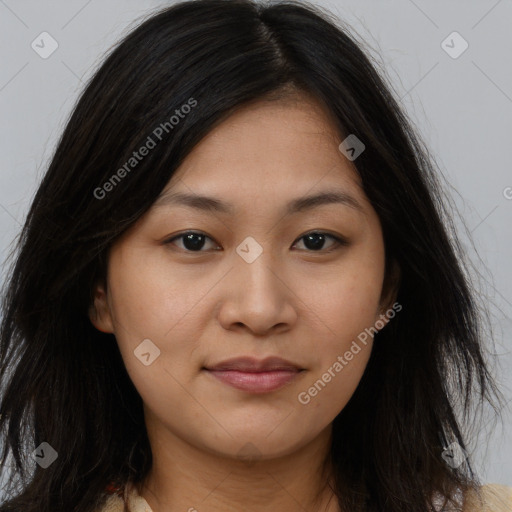 Joyful asian young-adult female with long  brown hair and brown eyes