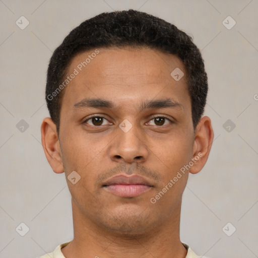 Neutral latino young-adult male with short  brown hair and brown eyes