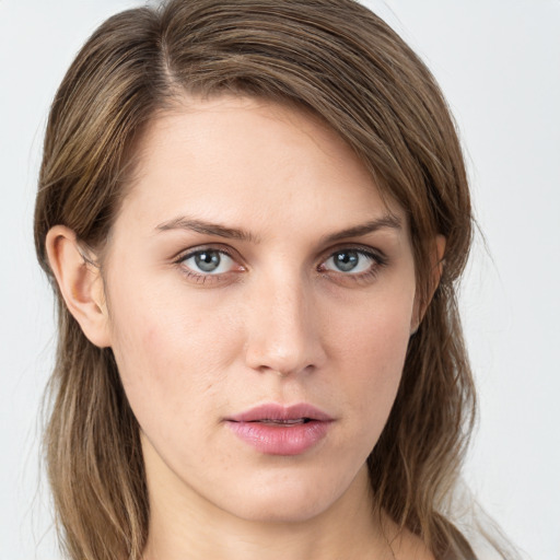 Neutral white young-adult female with medium  brown hair and green eyes