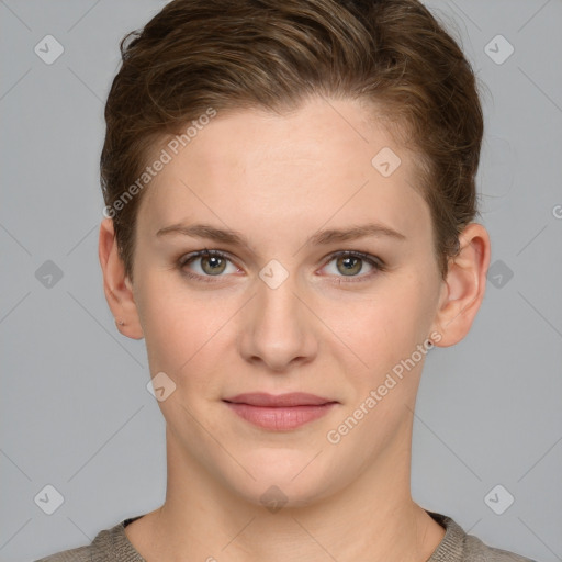 Joyful white young-adult female with short  brown hair and grey eyes