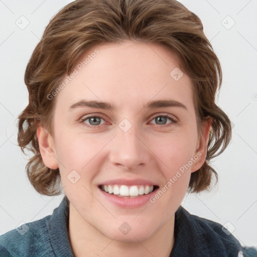 Joyful white young-adult female with medium  brown hair and blue eyes