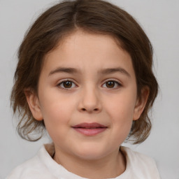 Joyful white child female with medium  brown hair and brown eyes