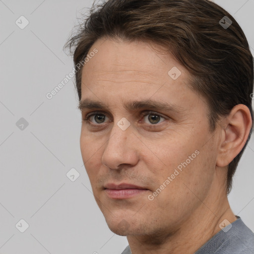 Neutral white adult male with short  brown hair and brown eyes