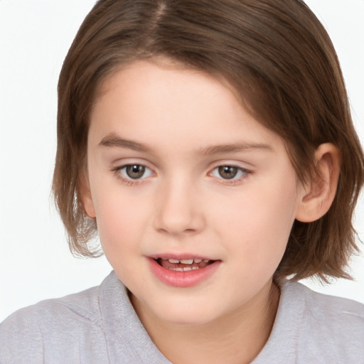 Joyful white child female with medium  brown hair and brown eyes