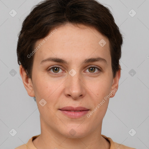 Joyful white young-adult female with short  brown hair and grey eyes