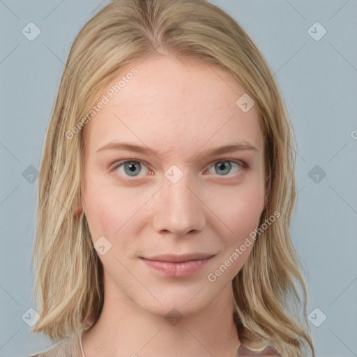 Joyful white young-adult female with long  brown hair and blue eyes