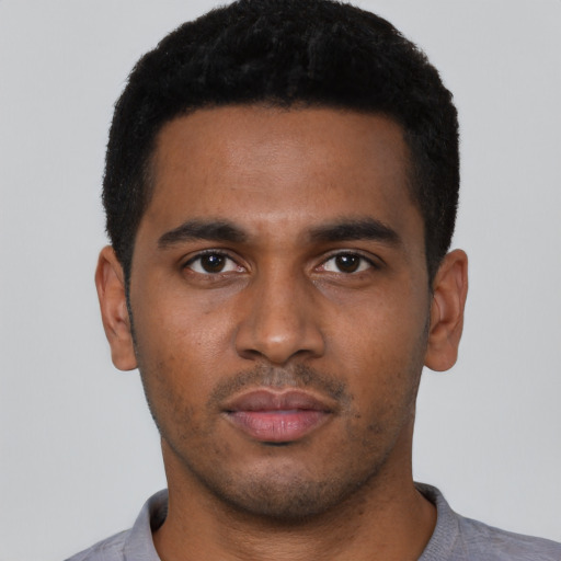 Neutral black young-adult male with short  black hair and brown eyes