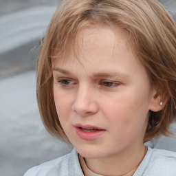 Neutral white child female with medium  brown hair and brown eyes