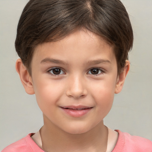 Joyful white child female with short  brown hair and brown eyes