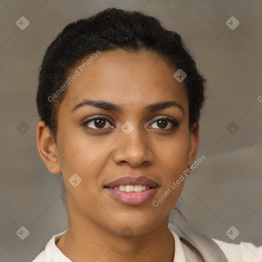 Joyful black young-adult female with short  brown hair and brown eyes