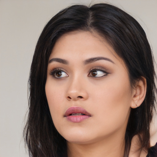 Neutral asian young-adult female with long  brown hair and brown eyes