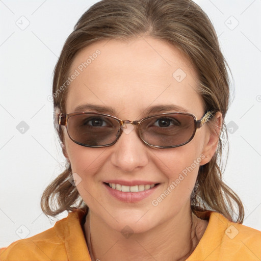 Joyful white young-adult female with medium  brown hair and blue eyes