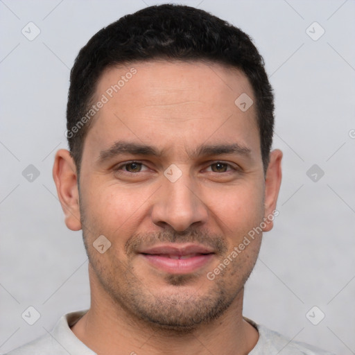 Joyful white young-adult male with short  brown hair and brown eyes