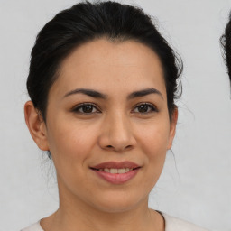 Joyful asian young-adult female with medium  brown hair and brown eyes