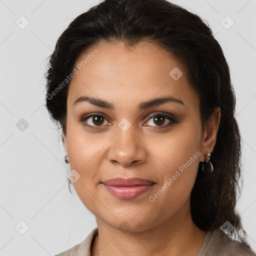 Joyful latino young-adult female with medium  brown hair and brown eyes