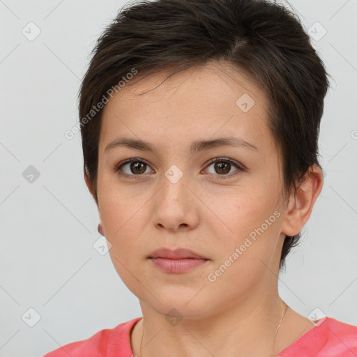 Neutral white young-adult female with short  brown hair and brown eyes