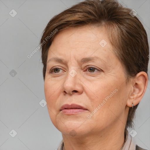 Joyful white adult female with short  brown hair and brown eyes