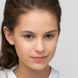 Joyful white child female with short  brown hair and brown eyes