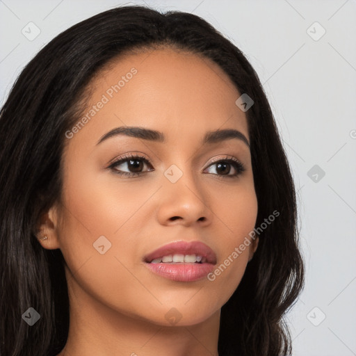 Joyful latino young-adult female with long  brown hair and brown eyes