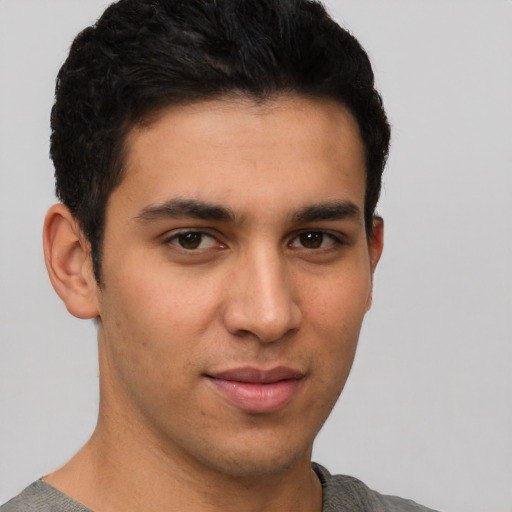 Neutral latino young-adult male with short  brown hair and brown eyes