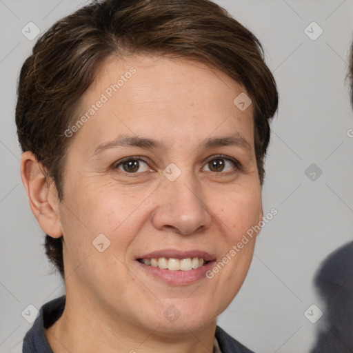 Joyful white adult female with short  brown hair and brown eyes