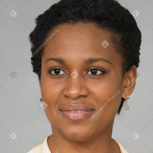 Joyful black young-adult female with short  brown hair and brown eyes