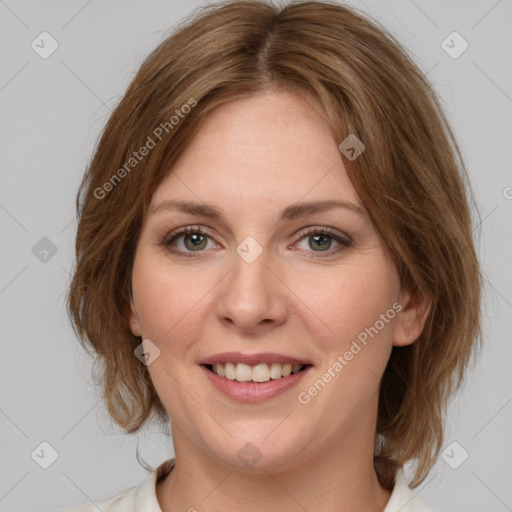 Joyful white young-adult female with medium  brown hair and green eyes