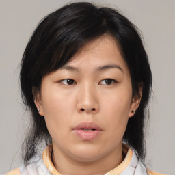 Neutral asian young-adult female with medium  black hair and brown eyes